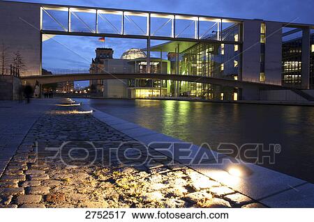 Bridge across river lit up at dusk, Spree River, Berlin, Germany View Large Photo Image Stock Photo - Bridge across river lit up at dusk, Spree River, Berlin, Germany . Fotosearch