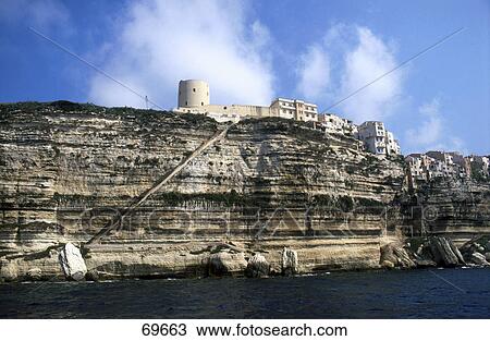 Stock Image - Building on chalk cliff, Bonifacio, South Corsica, France . Fotosearch