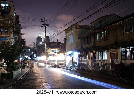 Stock Image - Buildings along street, Puxi, Shanghai, China . Fotosearch
