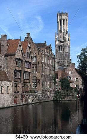 Buildings at waterfront, The Belfry, Bruges, West Flanders, Belgium View Large Photo Image Stock Photo - Buildings at waterfront, The Belfry, Bruges, West Flanders, Belgium . Fotosearch