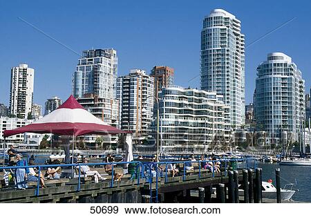 Stock Photo - Buildings in city, Granville Island, Vancouver, British Columbia, Canada . Fotosearch