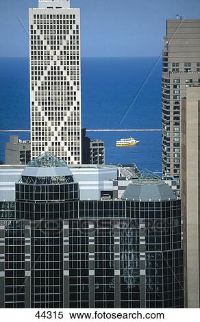 Stock Photography - Buildings in city, Michigan Lake, Chicago, Illinois, USA . Fotosearch