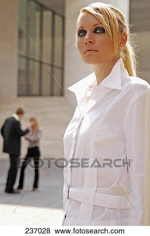 Stock Photo - Businesswoman looking serious . Fotosearch