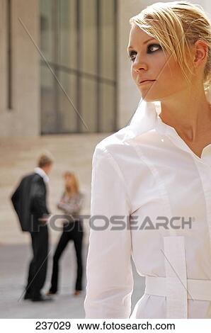 Stock Photo - Businesswoman looking serious . Fotosearch