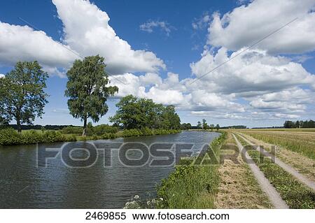 Canal flowing through landscape, Gota Canal, Sweden View Large Photo Image Stock Photography - Canal flowing through landscape, Gota Canal, Sweden . Fotosearch