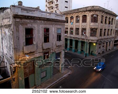 Stock Image - Car traveling in city road, Calle San Lazaro, Havana, Cuba . Fotosearch