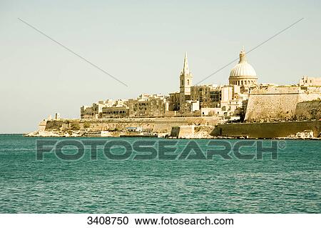 Stock Image - Carmelite church, fort and Marsamxett harbour, Valletta, Malta, Europe . Fotosearch