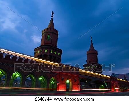 Picture - Castle lit up against dusky sky . Fotosearch