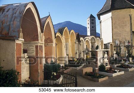 Stock Photography - Cemetery in church, St Mary Church, Mals, Tyrol, Italy . Fotosearch