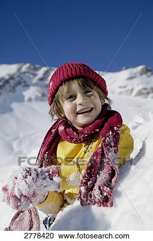 child playing in snow View Large Photo Image Stock Image - child playing in snow . Fotosearch