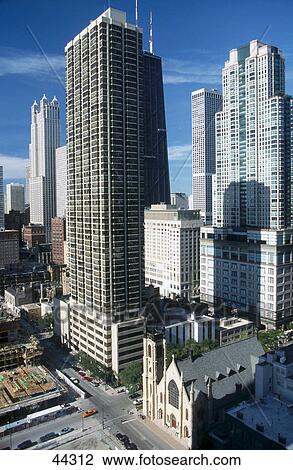 Church and skyscrapers in city, Chicago, Illinois, USA View Large Photo Image Stock Image - Church and skyscrapers in city, Chicago, Illinois, USA . Fotosearch