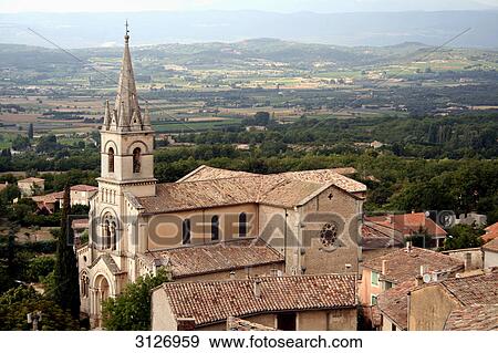 Stock Photo - Church of Bonnieux, France, aerial perspective . Fotosearch