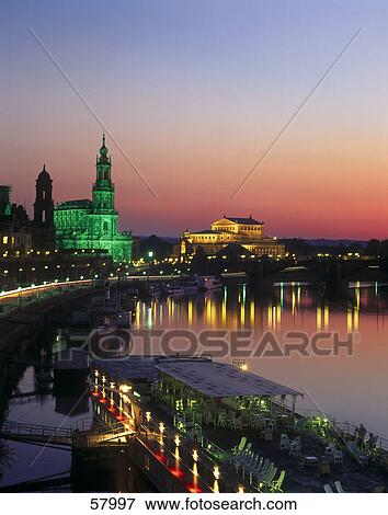 City at riverside lit up at dusk, Dresden Cathedral, Semperoper Opera House, Dresden, Saxony, Germany View Large Photo Image Stock Photo - City at riverside lit up at dusk, Dresden Cathedral, Semperoper Opera House, Dresden, Saxony, Germany . Fotosearch