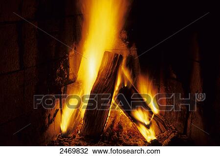 Stock Image - Close-up of burning firewood . Fotosearch