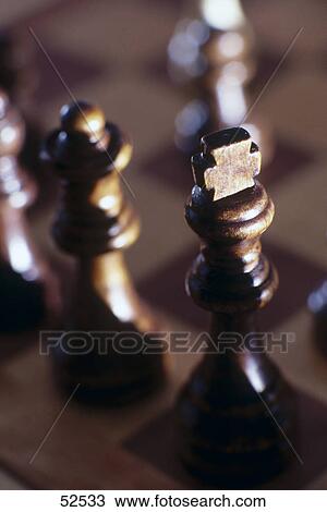 Close-up of chess pieces on chessboard View Large Photo Image Stock Image - Close-up of chess pieces on chessboard . Fotosearch