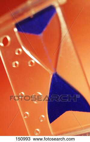 Stock Image - Close-up of hourglass . Fotosearch