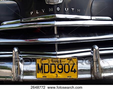 Stock Image - Close-up of licence plate on car's grille, Cuba . Fotosearch