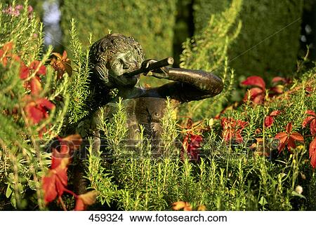 Close-up of plants and statue, Baden-Wurttemberg, Germany View Large Photo Image Picture - Close-up of plants and statue, Baden-Wurttemberg, Germany . Fotosearch