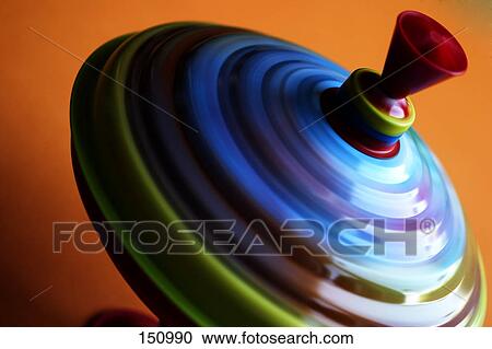 Close-up of spinning top View Large Photo Image Stock Image - Close-up of spinning top . Fotosearch