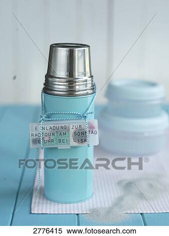 Close-up of thermos flask with tag on table View Large Photo Image Stock Photography - Close-up of thermos flask with tag on table . Fotosearch