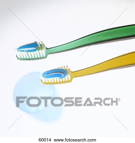 Picture - Close-up of toothpaste and toothbrushes . Fotosearch