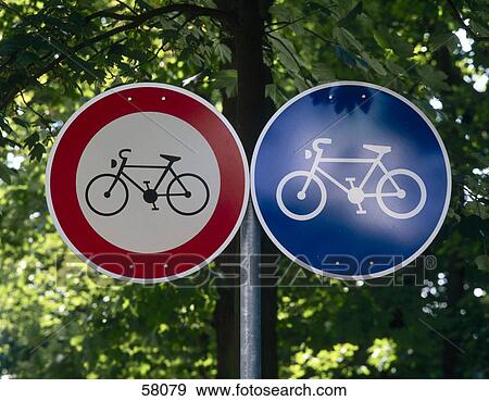 Close-up of two bicycle lane signboards View Large Photo Image Stock Photo - Close-up of two bicycle lane signboards . Fotosearch