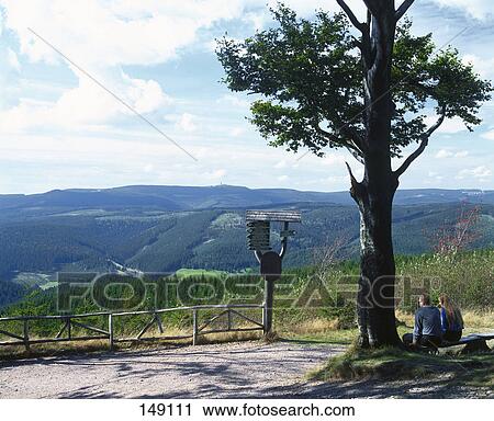 Couple admiring scenery, Kickelhahn, Thuringia, Germany View Large Photo Image Stock Image - Couple admiring scenery, Kickelhahn, Thuringia, Germany . Fotosearch