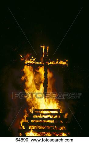 Stock Image - Cross burning at night, Austria . Fotosearch