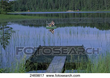 Duck house in lake, Sweden View Large Photo Image Stock Photo - Duck house in lake, Sweden . Fotosearch
