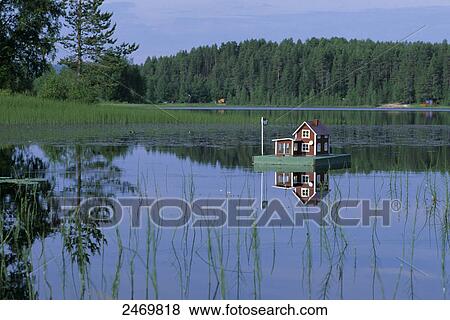 Duck house in lake, Sweden View Large Photo Image Stock Photo - Duck house in lake, Sweden . Fotosearch