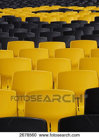 Stock Image - Empty chairs in theatre, Locarno, Tessin Canton, Switzerland . Fotosearch