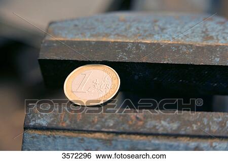 Euro uunder pressure, close-up View Large Photo Image Stock Photograph - Euro uunder pressure, close-up . Fotosearch