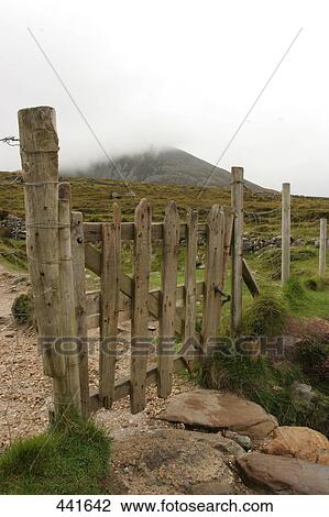 Stock Image - Fence on landscape, Croagh Patrick, County Mayo, Ireland . Fotosearch