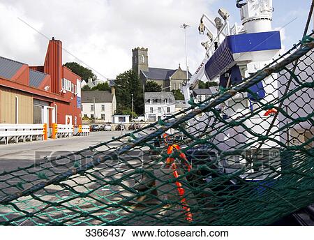 Fishing harbour, fishing net in the foreground, Killybegs, Ireland View Large Photo Image Stock Photo - Fishing harbour, fishing net in the foreground, Killybegs, Ireland . Fotosearch