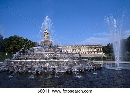 Stock Image - Fountain in front of castle, Latona Fountain, Herrenchiemsee Castle, Herrenchiemsee, Herreninsel, Bavaria, Germany . Fotosearch