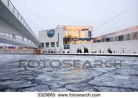 Frozen river and Federal Chancellery in winter, Berlin, Germany View Large Photo Image Stock Photography - Frozen river and Federal Chancellery in winter, Berlin, Germany . Fotosearch
