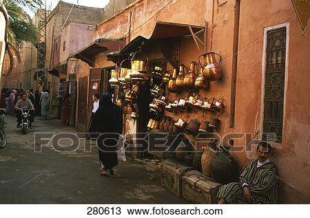 Stock Image - Group of people at market . Fotosearch
