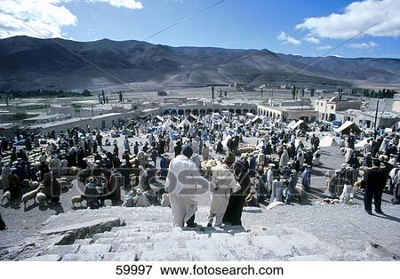 Stock Photo - Group of people in an animal market . Fotosearch