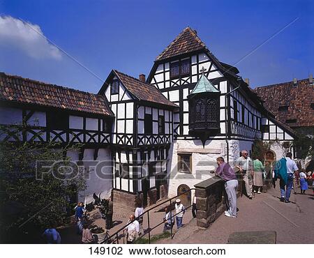 Stock Image - Group of tourists near castle, Germany . Fotosearch