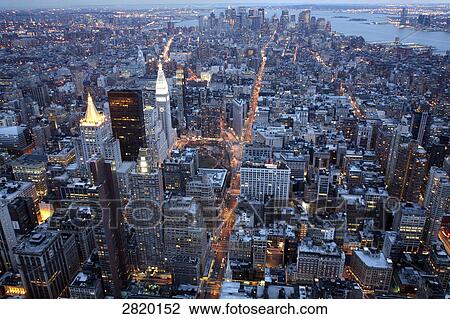 High angle view of cityscape lit up at dusk, Manhattan, New York City, New York State, USA View Large Photo Image Stock Image - High angle view of cityscape lit up at dusk, Manhattan, New York City, New York State, USA . Fotosearch