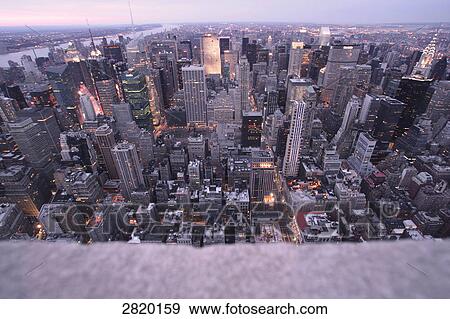 High angle view of cityscape lit up at dusk, Manhattan, New York City, New York State, USA View Large Photo Image Stock Photo - High angle view of cityscape lit up at dusk, Manhattan, New York City, New York State, USA . Fotosearch