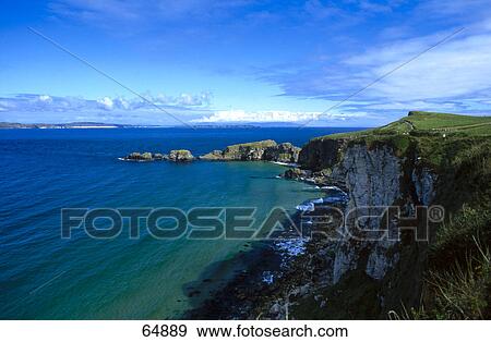 Stock Photo - High angle view of coastline, Carrick-A-Rede, County Antrim, Republic Of Ireland . Fotosearch