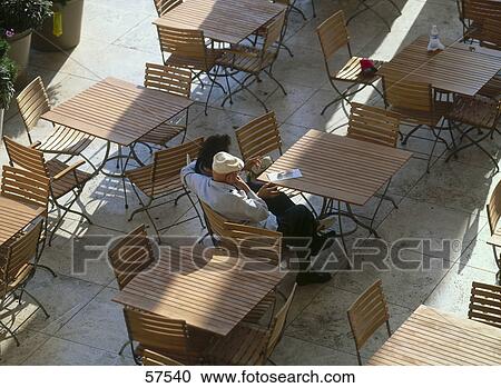 High angle view of couple sitting at cafe, Getty Museum, Brentwood, Los Angeles, California, USA View Large Photo Image Stock Image - High angle view of couple sitting at cafe, Getty Museum, Brentwood, Los Angeles, California, USA . Fotosearch