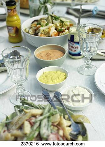 Stock Photograph - High angle view of food served on table . Fotosearch