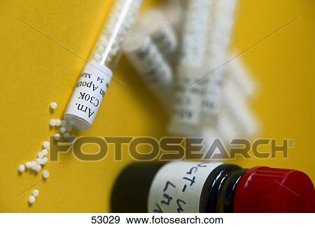 Stock Photo - High angle view of homeopathic medicines . Fotosearch