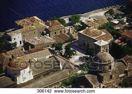 Stock Image - High angle view of houses in village, Monemvasia, Peloponnese, Greece . Fotosearch