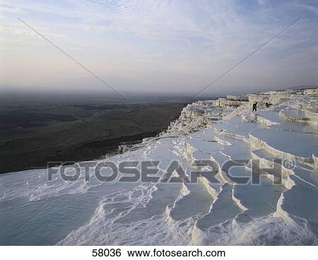 Stock Photograph - High angle view of limestone terraces, Pamukkale, Denizli Province, Anatolia, Turkey . Fotosearch