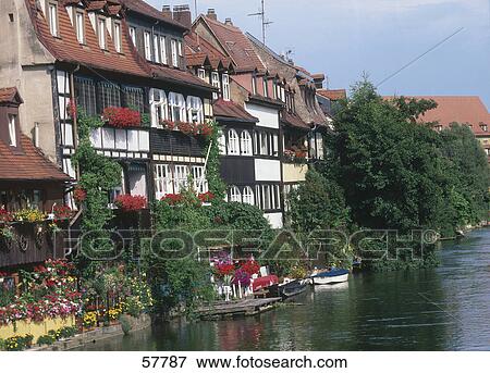 Stock Photo - Houses at riverside, Ljubljana River, Ljubljana, Slovenia . Fotosearch