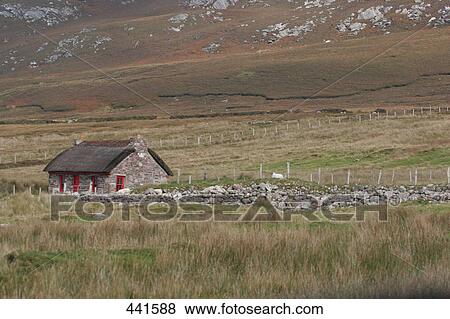Stock Photo - Hut on rural landscape, Achill Island, County Mayo, Republic of Ireland . Fotosearch