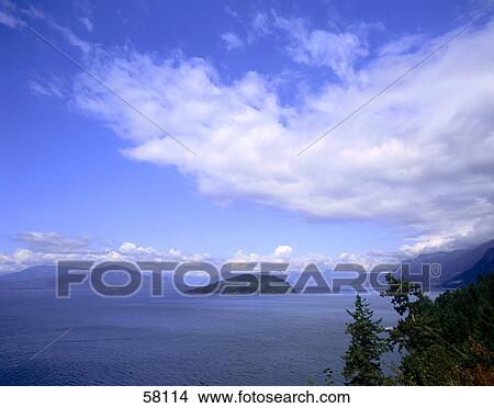 Picture - Island under cloudy sky, Vancouver Island, British Columbia, Canada . Fotosearch